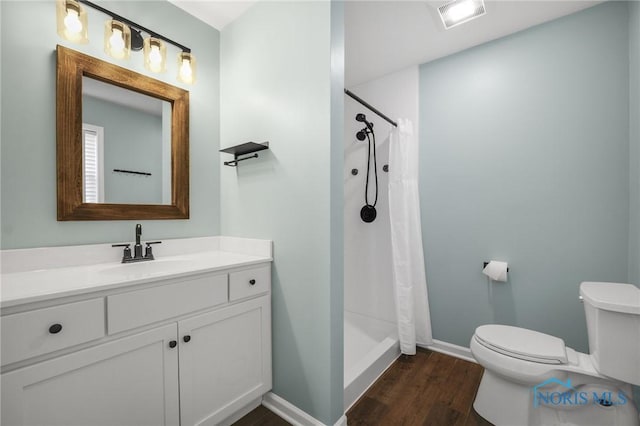 7060 Joannes Way, Maumee, OH 43537 - bathroom with toilet, wood finished floors, vanity, and a shower with curtain