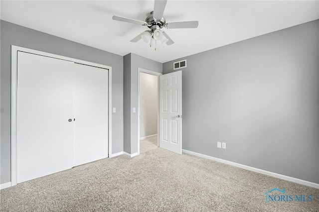 7060 Joannes Way, Maumee, OH 43537 - unfurnished bedroom with carpet floors, baseboards, a closet, and ceiling fan