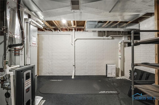7060 Joannes Way, Maumee, OH 43537 - unfinished below grade area with brick wall and heating unit