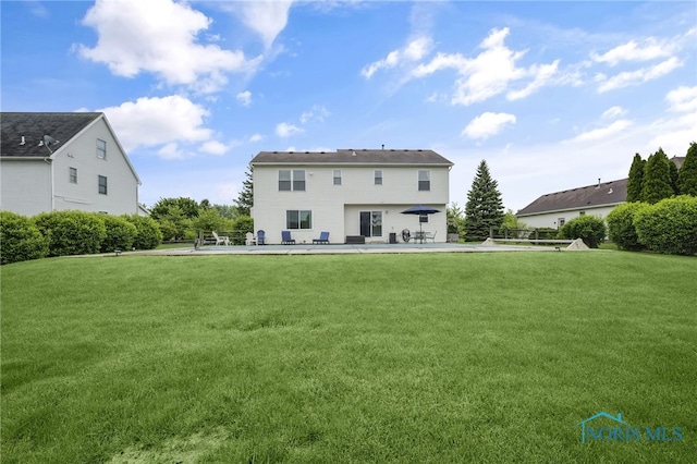 7060 Joannes Way, Maumee, OH 43537 - back of property with a lawn and a patio