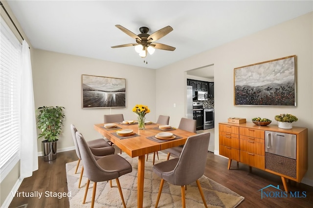 7060 Joannes Way, Maumee, OH 43537 - dining area with dark wood-type flooring, a ceiling fan, and baseboards