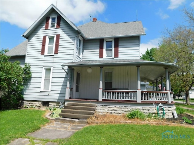 203 N Union St, Fostoria, OH 44830 - view of front of home with a porch, roof with shingles, a front lawn, and a chimney