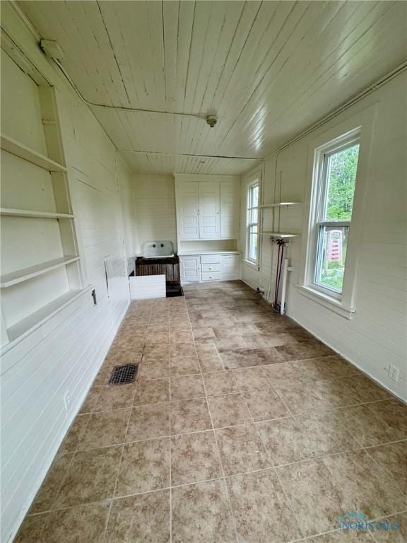 2108 N Michigan St, Toledo, OH 43611 - unfurnished living room with wood ceiling
