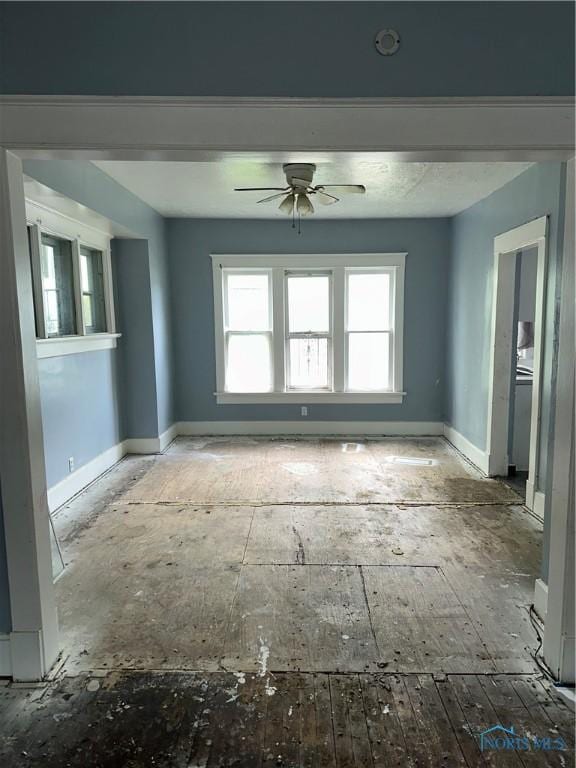 1013 Pinewood Ave, Toledo, OH 43607 - spare room with ceiling fan and baseboards