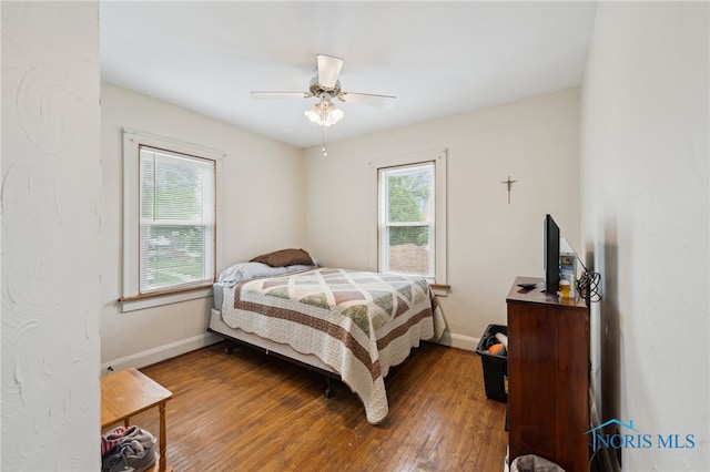 2352 108th St, Toledo, OH 43611 - bedroom with wood finished floors and a ceiling fan