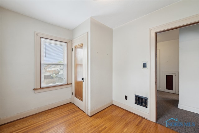 2352 108th St, Toledo, OH 43611 - unfurnished bedroom with light wood-type flooring and baseboards