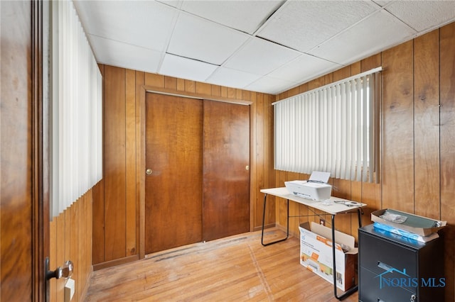 2352 108th St, Toledo, OH 43611 - home office featuring wood walls, hardwood / wood-style flooring, and a paneled ceiling