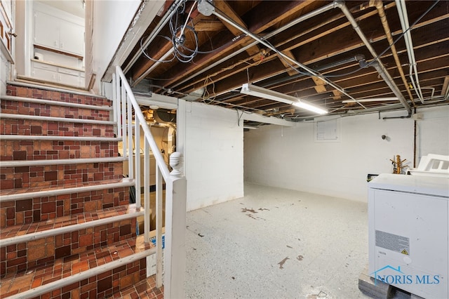 2352 108th St, Toledo, OH 43611 - unfinished basement featuring washer / dryer, stairs, and electric panel