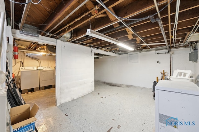 2352 108th St, Toledo, OH 43611 - unfinished basement with washing machine and clothes dryer and fridge