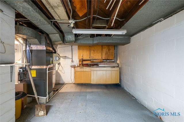 2352 108th St, Toledo, OH 43611 - unfinished below grade area featuring concrete block wall and heating unit