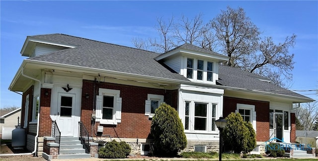 5907 N Berkey Southern Rd, Berkey, OH 43504 - bungalow with entry steps, brick siding, and roof with shingles