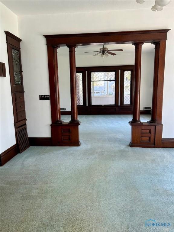 5907 N Berkey Southern Rd, Berkey, OH 43504 - unfurnished living room with carpet, ceiling fan, and baseboards