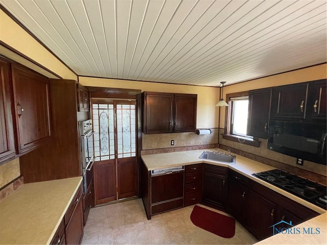 5907 N Berkey Southern Rd, Berkey, OH 43504 - kitchen featuring black appliances, a sink, light countertops, and wood ceiling