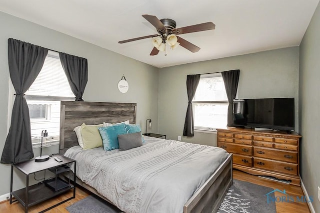 3134 Cragmoor Ave, Toledo, OH 43614 - bedroom with wood finished floors, ceiling fan, and baseboards