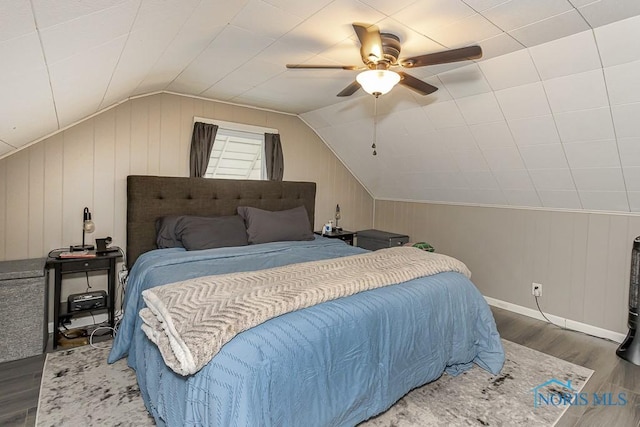 3134 Cragmoor Ave, Toledo, OH 43614 - bedroom with wood finished floors, vaulted ceiling, a ceiling fan, and baseboards