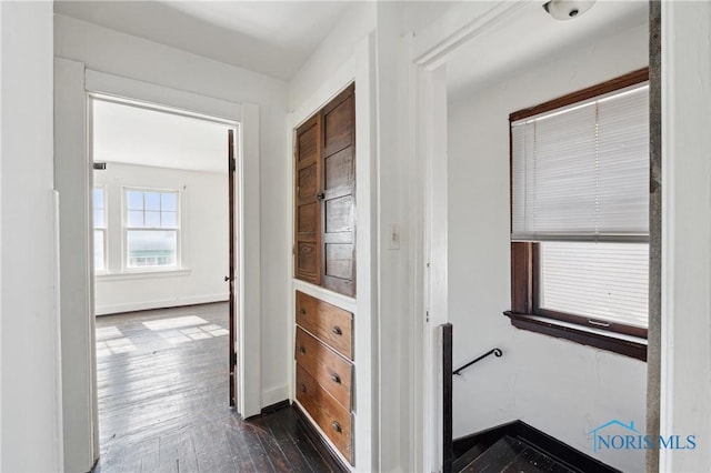 1908 Parkdale Ave, Toledo, OH 43607 - hall featuring dark wood-type flooring and baseboards