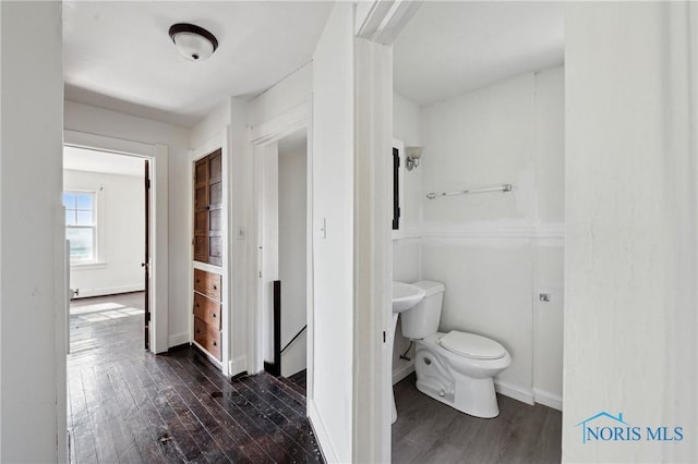 1908 Parkdale Ave, Toledo, OH 43607 - bathroom with wood finished floors, toilet, and baseboards