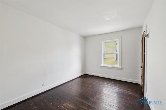 1908 Parkdale Ave, Toledo, OH 43607 - unfurnished room with hardwood / wood-style floors and baseboards