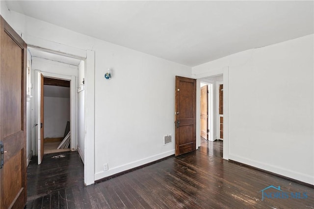 1908 Parkdale Ave, Toledo, OH 43607 - unfurnished bedroom featuring wood-type flooring and baseboards