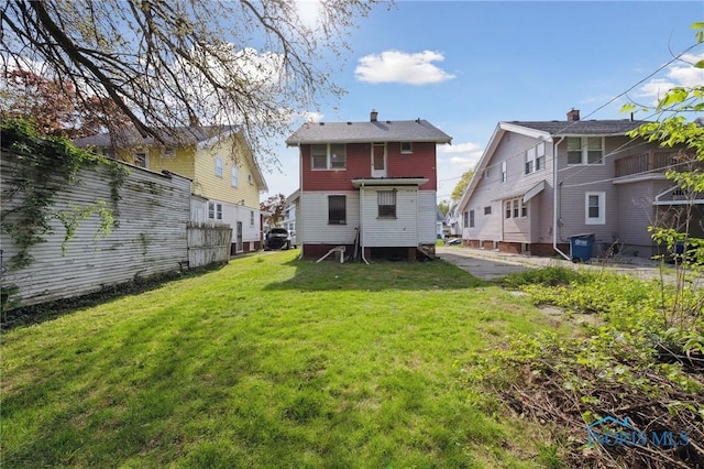 1908 Parkdale Ave, Toledo, OH 43607 - back of house with a lawn