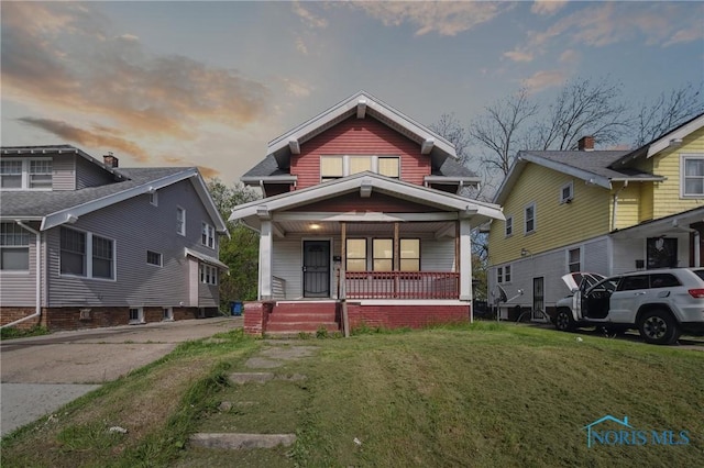 1908 Parkdale Ave, Toledo, OH 43607 - view of front of home featuring covered porch and a lawn