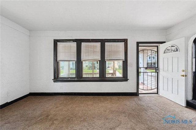 1908 Parkdale Ave, Toledo, OH 43607 - carpeted entryway with baseboards