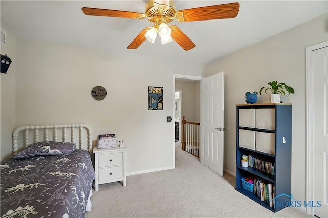 5532 Bentwood Dr, Toledo, OH 43615 - carpeted bedroom with baseboards and a ceiling fan