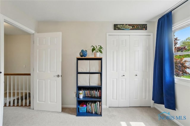 5532 Bentwood Dr, Toledo, OH 43615 - carpeted bedroom with a closet and baseboards