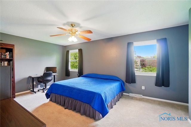 5532 Bentwood Dr, Toledo, OH 43615 - bedroom featuring carpet, an office area, baseboards, and a ceiling fan