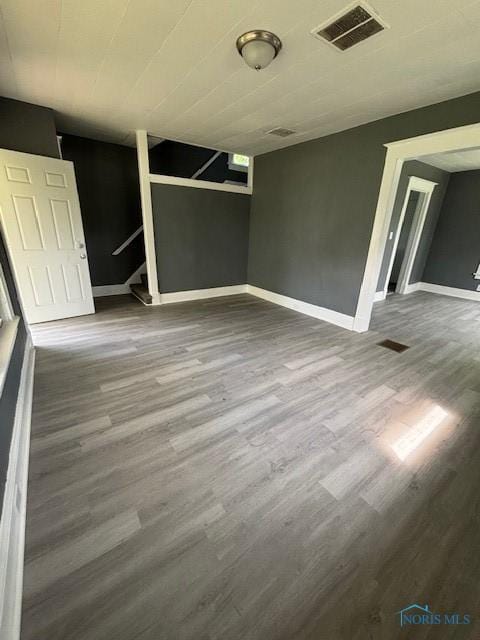 938 Western Ave, Toledo, OH 43609 - unfurnished bedroom featuring wood finished floors and baseboards