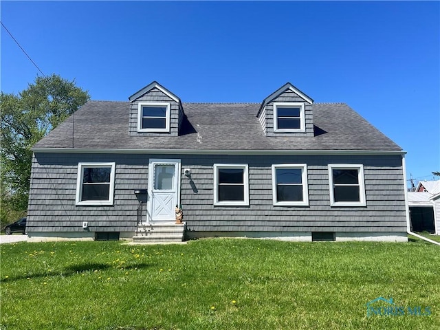 64 Saint Clair St, Tiffin, OH 44883 - cape cod home with entry steps and a front lawn