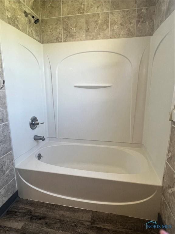 64 Saint Clair St, Tiffin, OH 44883 - bathroom featuring wood finished floors and shower / bath combination