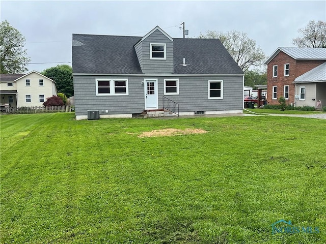 64 Saint Clair St, Tiffin, OH 44883 - rear view of house with entry steps, roof with shingles, and central AC