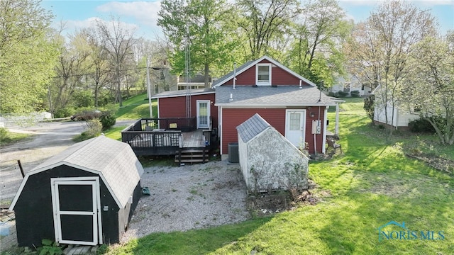 1037 Stevenson St, Napoleon, OH 43545 - view of shed featuring central AC and view of scattered trees