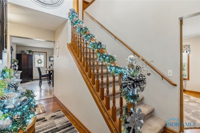 9704 Monto Ln, Findlay, OH 45840 - stairs with wood finished floors and baseboards