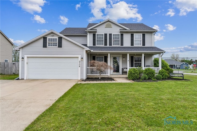 9704 Monto Ln, Findlay, OH 45840 - traditional home featuring concrete driveway, covered porch, and roof with shingles