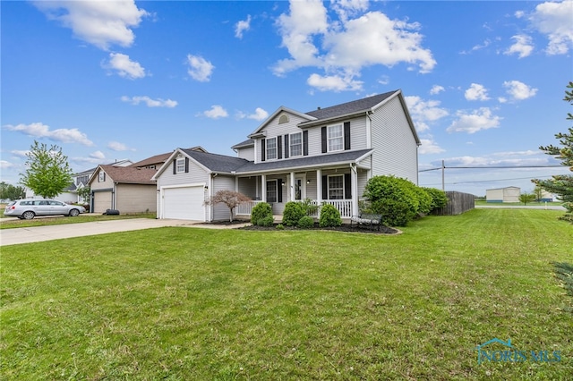 9704 Monto Ln, Findlay, OH 45840 - traditional home with covered porch, concrete driveway, and a garage
