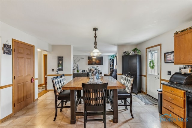 9704 Monto Ln, Findlay, OH 45840 - dining area with light tile patterned flooring and baseboards