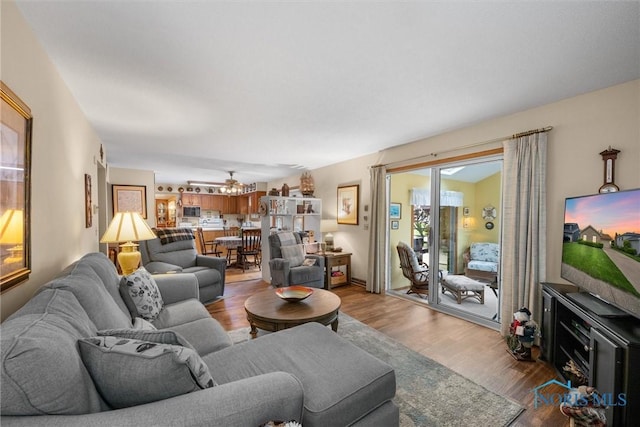 2659 Coveview Dr, Toledo, OH 43611 - living room featuring wood finished floors and a chandelier