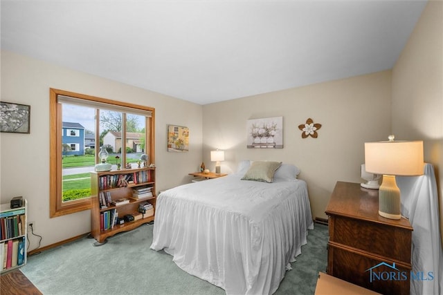 2659 Coveview Dr, Toledo, OH 43611 - carpeted bedroom with baseboards