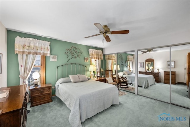 2659 Coveview Dr, Toledo, OH 43611 - carpeted bedroom featuring multiple closets and ceiling fan
