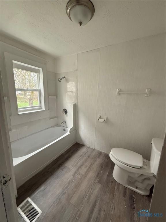 1821 Ridgewood Ave, Toledo, OH 43608 - bathroom featuring toilet and wood finished floors