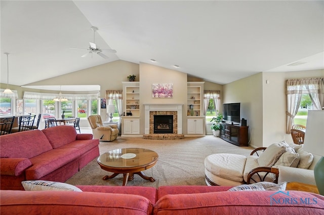 29030 Hufford Rd, Perrysburg, OH 43551 - living area with a ceiling fan, high vaulted ceiling, light carpet, a fireplace, and built in shelves