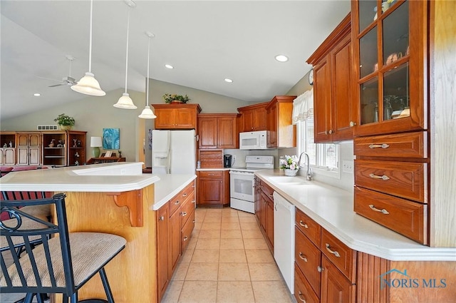 29030 Hufford Rd, Perrysburg, OH 43551 - kitchen featuring white appliances, a sink, vaulted ceiling, light countertops, and ceiling fan