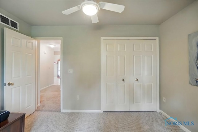 29030 Hufford Rd, Perrysburg, OH 43551 - unfurnished bedroom with carpet flooring, a closet, baseboards, and a ceiling fan