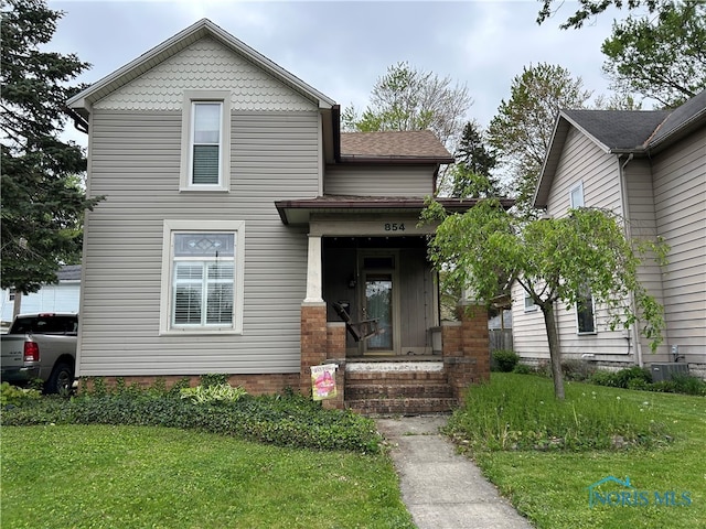 854 Maple Ave, Findlay, OH 45840 - view of front of property with a front yard