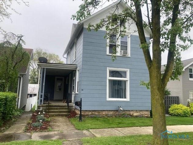 94 Liberty St, Tiffin, OH 44883 - view of front of house featuring cooling unit