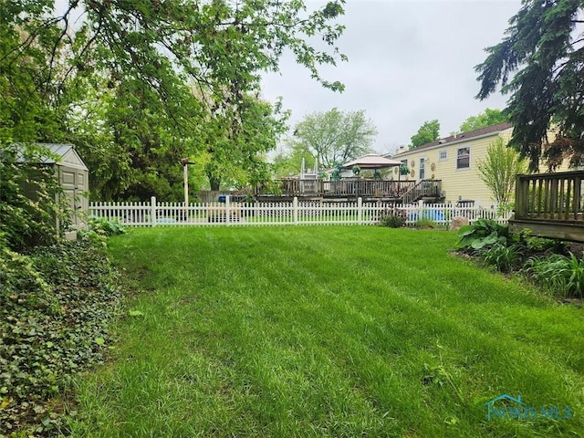 4405 Oldenburg Dr, Toledo, OH 43611 - view of yard with a wooden deck