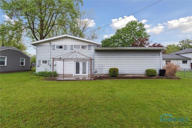 1639 Brookside Dr, Findlay, OH 45840 - back of house with french doors, a patio, and cooling unit