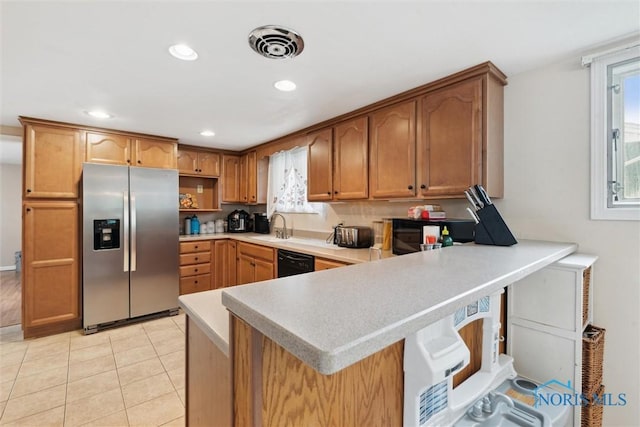 1639 Brookside Dr, Findlay, OH 45840 - kitchen featuring stainless steel fridge with ice dispenser, black dishwasher, plenty of natural light, a peninsula, and recessed lighting